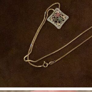 Elegant Gold and Silver Pendant Necklace